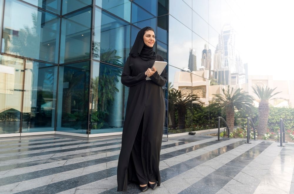 Woman In UAE In Front Of Building