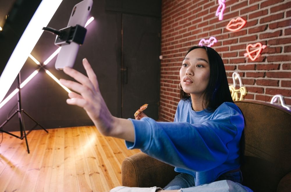 Influencer Filming At Desk