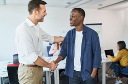 Boss Shaking Hands With Employee