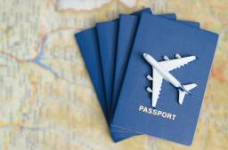 Plane And Passports On Map