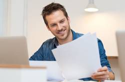 Man Holding A Document