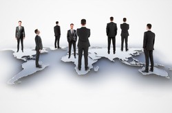Business Men Standing On Map