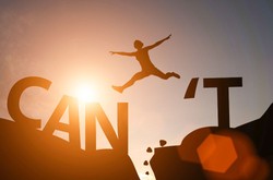 Person Jumping Over Cliffs