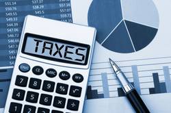 Calculator And Tax Papers