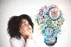 Student With Lightbulb Of Business Ideas