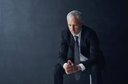 Business Man Looking Regretful 