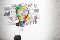 Student With Lightbulb Of Business Ideas