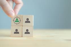 Person Picking Out Block Figure