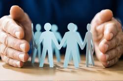 Hands With Paper Cut Out Figures"