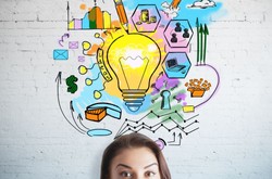 Student With Lightbulb Of Business Ideas