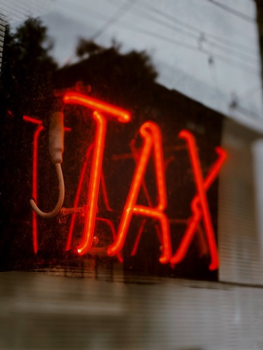 stock photo red light sign saying tax