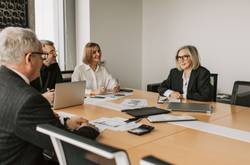 People Working On An Advisory Board