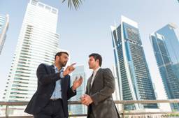 Company Man In Dubai Talking To People