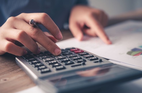 Stock Photo Man Working With Calculator