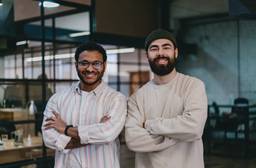 Founders planning Dubai free zone company setup in a modern workspace.