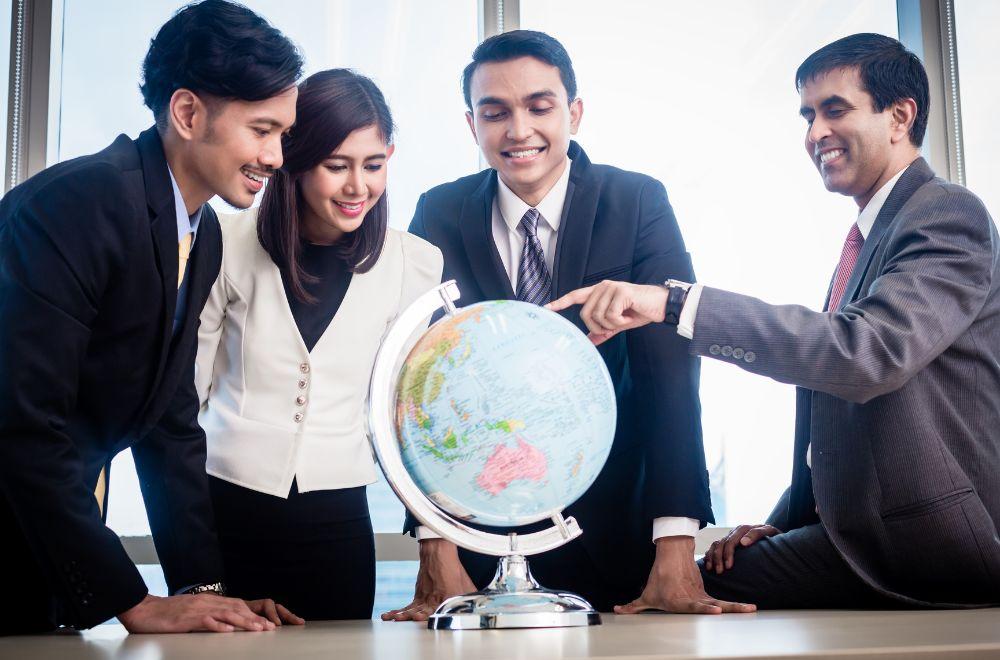 People Looking At Globe