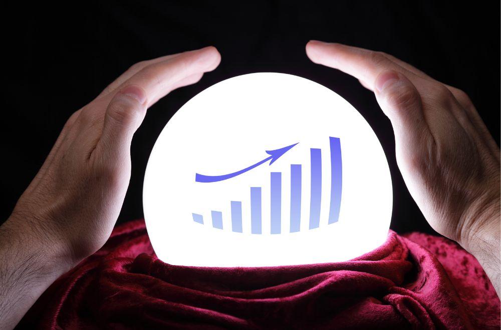 Man's Hands Holding Crystal Ball With Graph